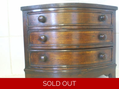 Bow front chest in mahogany